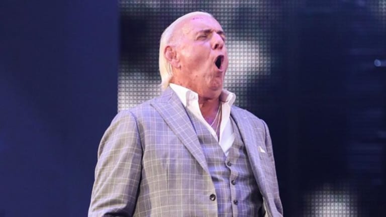 Friday Morning News Update (5/22) - Ric Flair Re-Signs With WWE, IMPACT Wrestling Stars Get Married and Kofi Kingston Says CM Punk Gave Him Advice Before WWE Debut