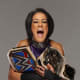 "Bayley Dos Straps" takes the top of this week's rankings! On Monday, she had a hand in Sasha winning the title. Although Kairi chased her to the back, the video came up with Bayley beating Kairi down enough to distract Asuka. On Friday, she successfully defended the SmackDown Women's Championship against Nikki Cross. Yes, the Golden Role Models are still the rulers of the women's divisions on RAW and SmackDown, but Bayley takes the top because her title win was more decisive. 