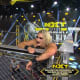 Rhea Ripley has been terrorized by the Robert Stone Brand over the last couple of months, particularly by Mercedes Martinez who has been on her like white on rice. Last week Rhea challenged Mercedes to a cage match and the two wasted no time getting the plunder out to beat the holy hell out of each other. This back and forth tilt saw chairs, kendo sticks, and even an attempt by Robert Stone himself to get involved. Martinez was particularly fond of the chair, which Rhea took exception to and would eventually catch her adversary in the Prism Trap, before the Latina Sensation would free herself using a loose kendo stick. After doing away with Stone, Rhea and Mercedes would fight in the corner, where Ripley would finish Mercedes off with a top rope Riptide through a table, vanquishing her foe once and for all.Though the finish went the opposite of what I expected, this was a fantastic main event bout. These two women brought it and my eyes were glued the entire story. As stacked as the NXT Women's division is, these two are among the toughest on the yard and we finally got an answer as to who the alpha is. Rhea's stock has suffered over the course of the year so this win puts her back on track, I expect her to find a way to Io Shirai before too long and challenge for the belt she lost at WrestleMania. As for Mercedes, I thought this was going to be her night, since arriving to NXT she has been a terror for everyone she's crossed paths with so I was genuinely surprised, though in such a brutal match, she doesn't take that much of a hit. But I question where she stands in NXT now, after the match Robert Stone not only dumped her but put a restraining order out on her to end that relationship. All signs point to her being a member of Retribution on Monday Night Raw, so if she is indeed done on NXT then its not a bad note to end on, in a stellar main event.