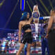 It looks like Bianca Belair will be granting our wishes and challenging Sasha Banks at Wrestlemania but that is not the only takeaway from last night. During Bianca's speech she was interrupted by Reginald, the sommelier, who wanted to give some advice to the Royal Rumble winner. He doesn't believe Belair is capable of beating Sasha Banks but I guess he has confidence in Carmella? It seems like Sasha wants this match just like the rest of us, but my concern is Mella. It seems like she wants to insert herself in this match and I really don't want to see that. This match needs to be 1v1. There's still a long time until mania so potentially this triple threat or something involving Mella could happen at either Fastlane or elimination chamber. I really don't want to see Mella vs Banks again and I don't know why she thinks she deserves another opportunity. If they're trying to book a triple threat just don't let it be at Wrestlemania. 