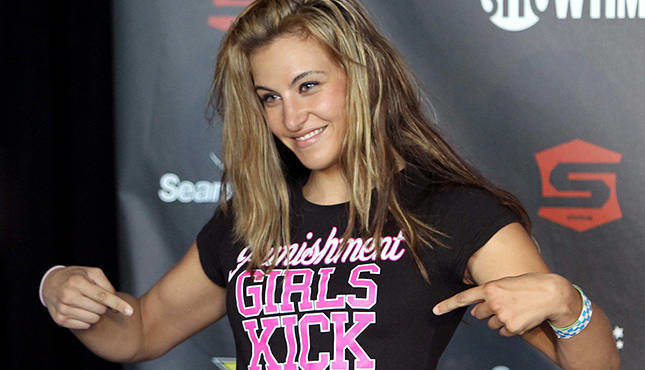 HOFFMAN ESTATES, IL - JULY 29: Miesha Tate stands on stage at the Strikeforce: Fedor vs. Henderson weigh-in at Sears Centre Arena on July 29, 2011 in Hoffman Estates, Illinois. (Photo by Josh Hedges/Forza LLC/Forza LLC via Getty Images)