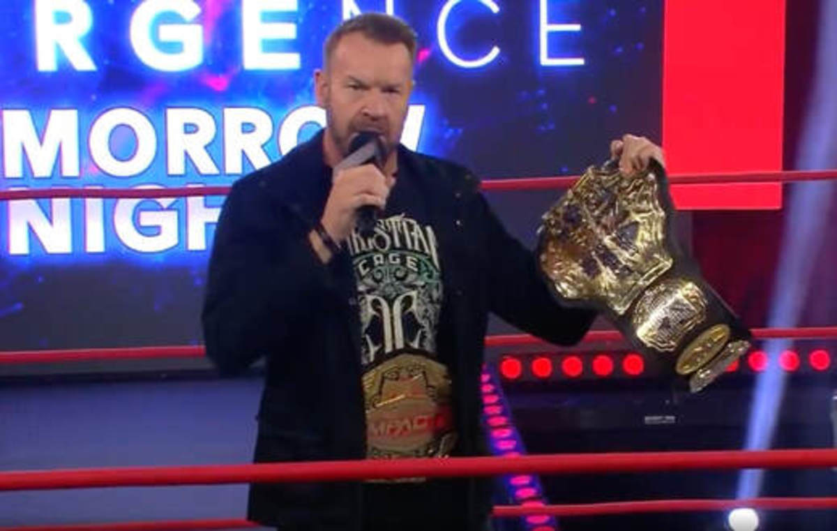 cage retires the tna world title